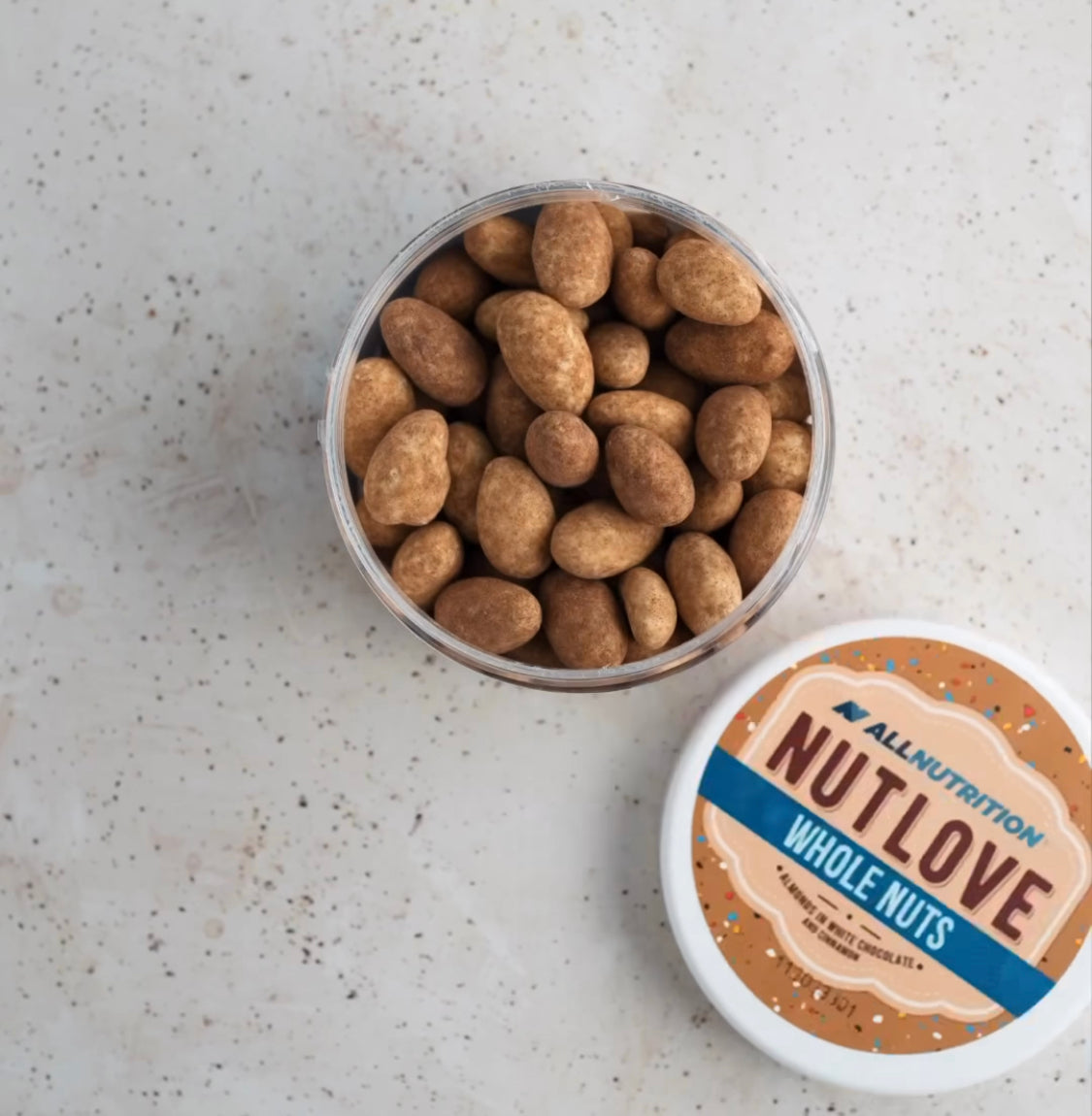 WHOLE NUTS migdolai baltajame šokolade su cinamonu 300g